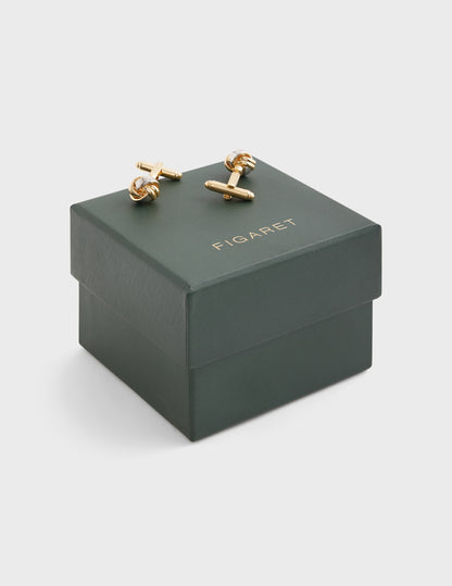 Gold and silver bow cufflinks