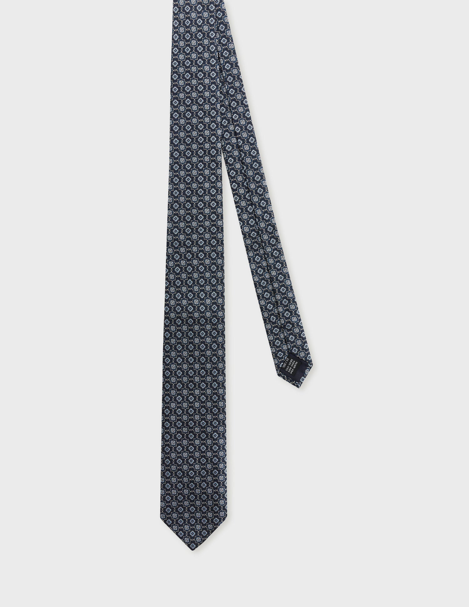 Silk twill tie with navy pattern